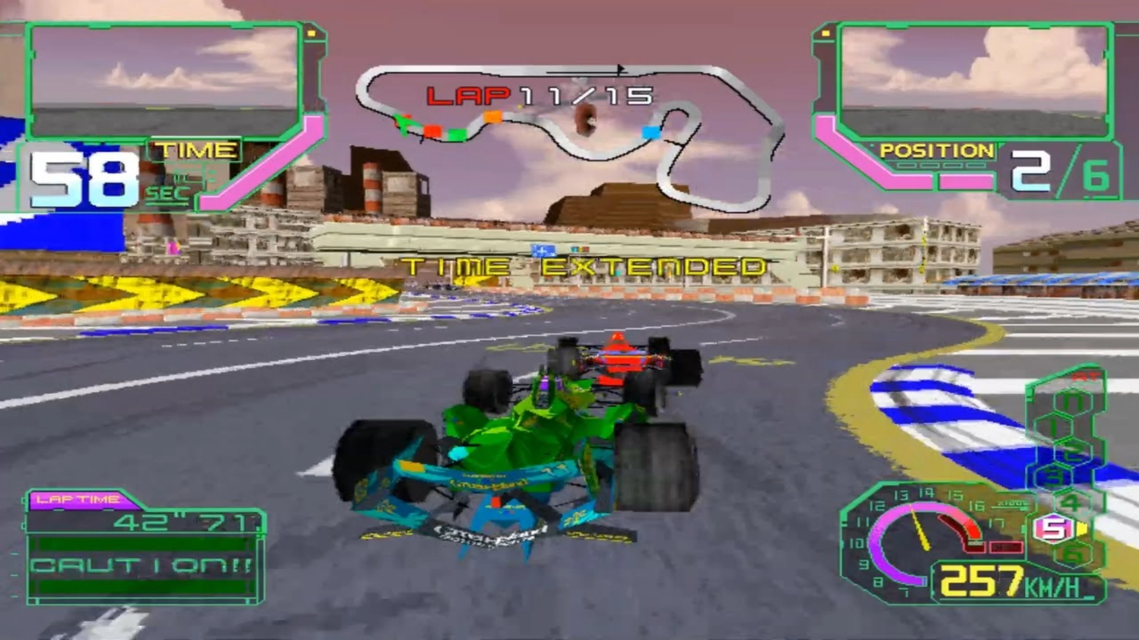 Green open-wheel car races through a city circuit in Ace Driver Victory Lap with the arcade HUD visible.