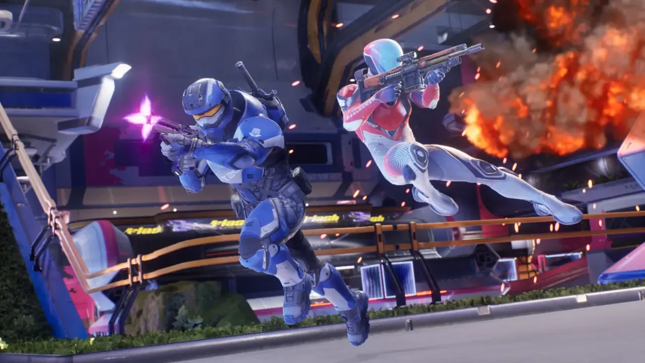 wo armored players fire their weapons during fast-paced combat in a futuristic arena in Splitgate: Arena Reloaded.