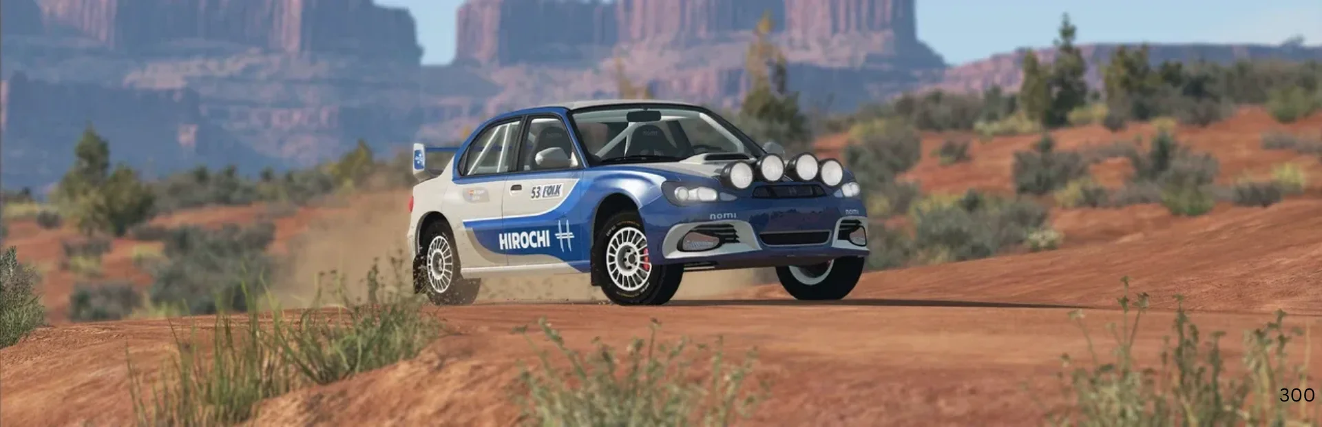 A blue and white rally car drives across a dirt road in BeamNG.drive.