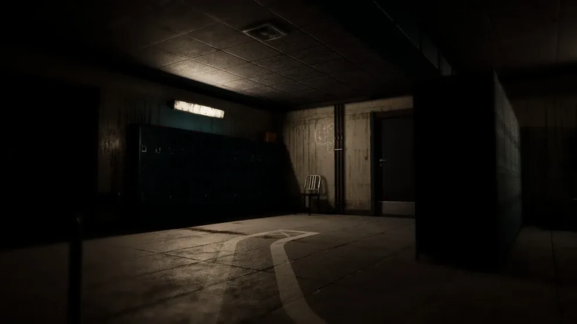 Dark interior corridor in Beautiful Light with lockers, a chair and a closed door.
