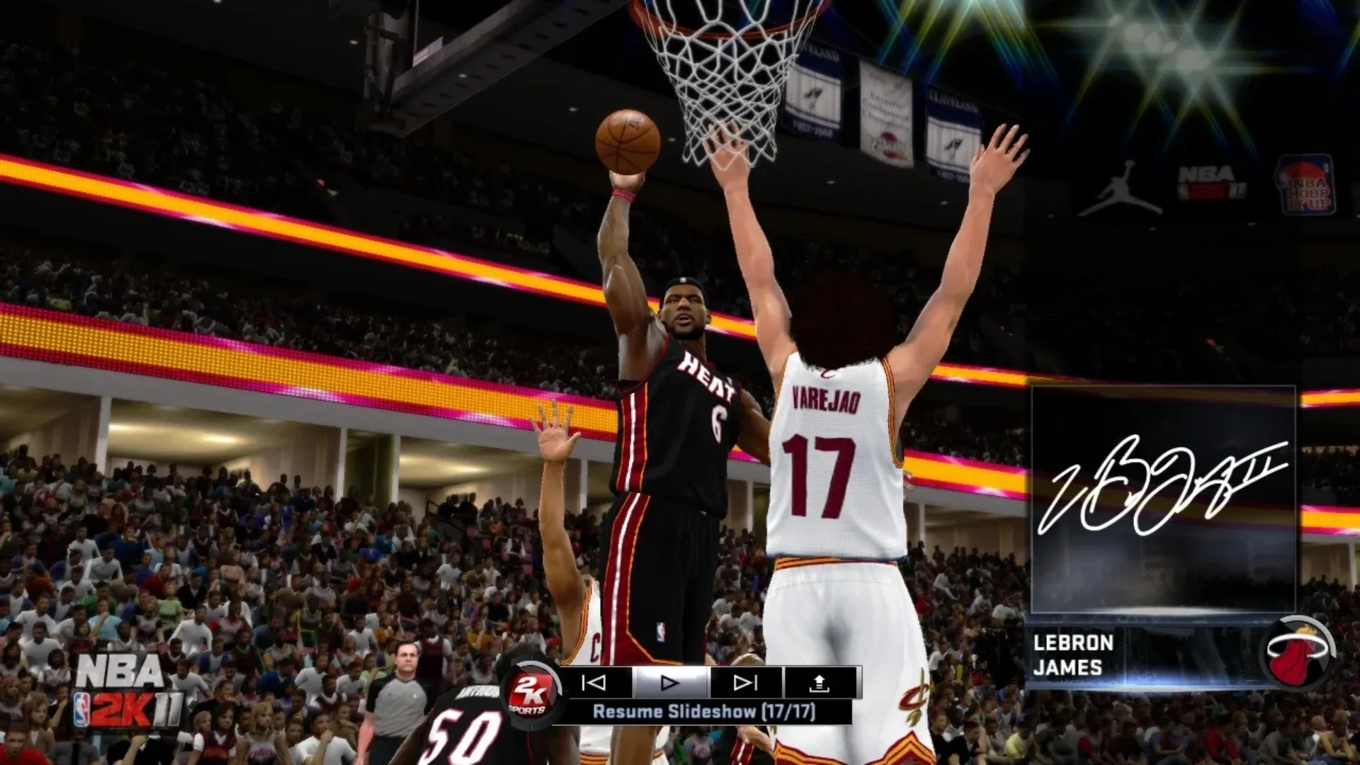 LeBron James attempts a layup against Anderson Varejao in NBA 2K11