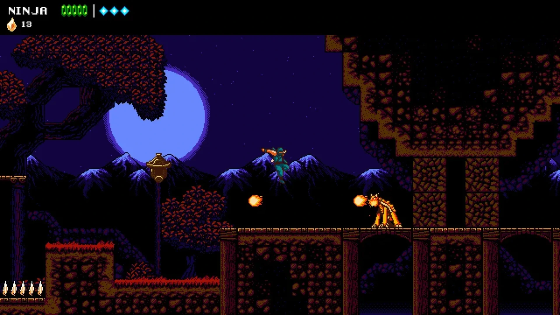 The Messenger ninja jumping over enemy fire beneath a large moon