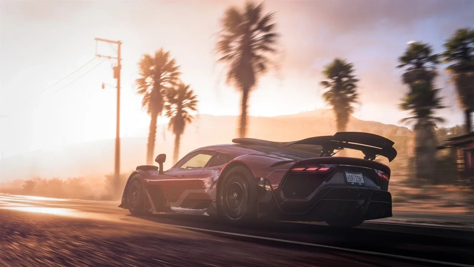 Forza Horizon 5 supercar speeding along a palm-lined road at sunset