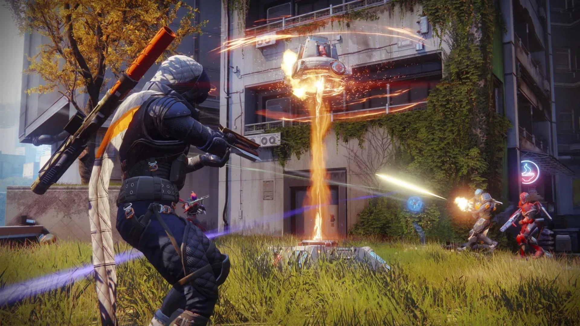 Destiny 2 Guardians exchange gunfire around an objective in an outdoor combat area.