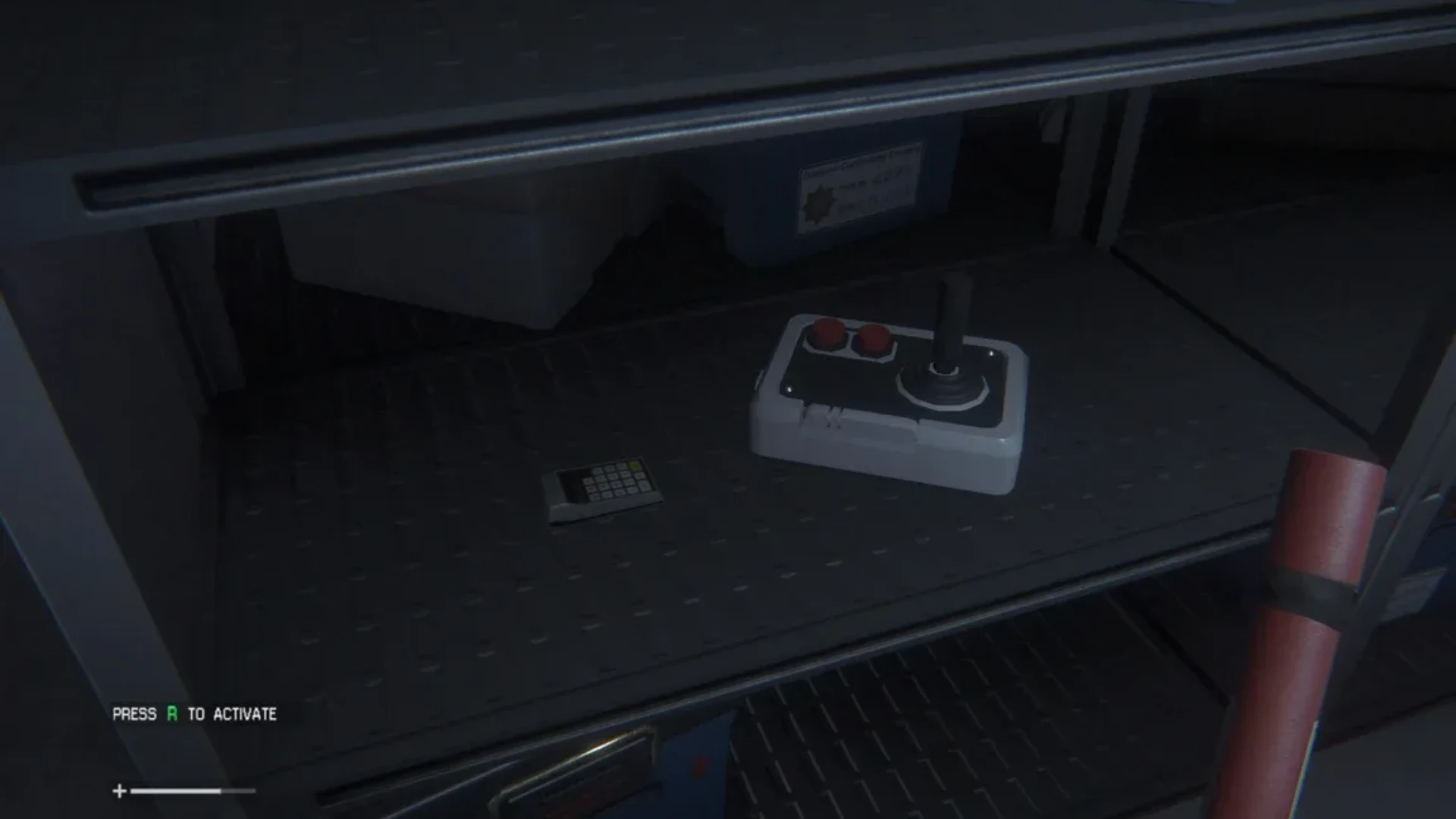 First-person view of a retro joystick on a shelf aboard Sevastopol station in Alien: Isolation.