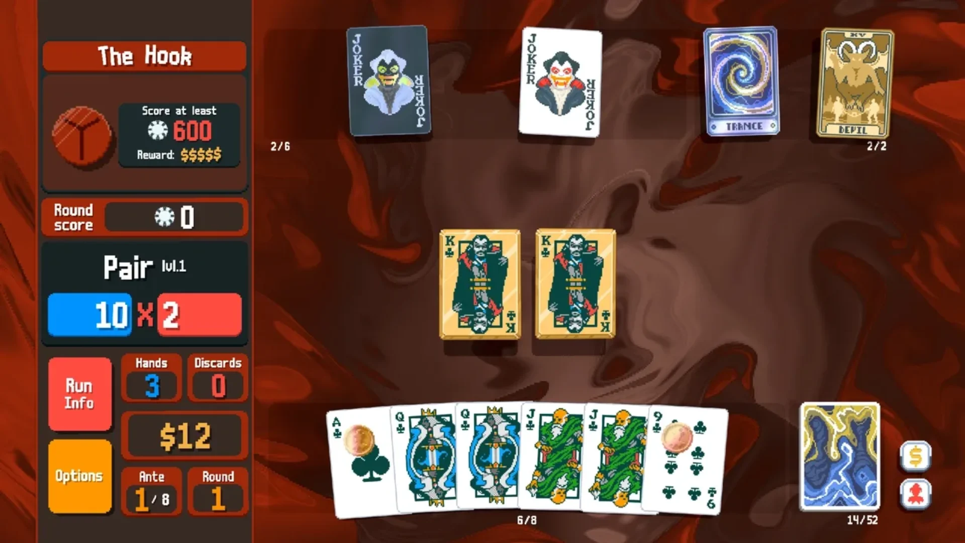 Balatro gameplay showing a pair of kings, two Jokers, tarot cards and The Hook blind requiring 600 chips.