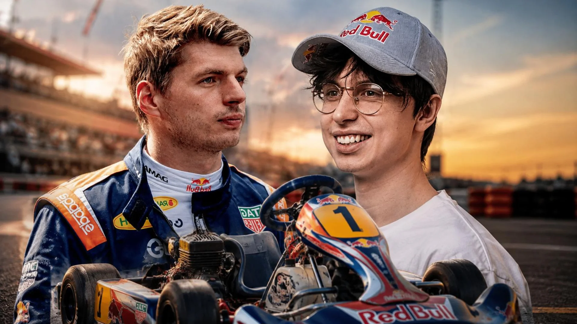 A racing driver and a streamer wearing glasses stand behind a Red Bull kart at a racetrack.