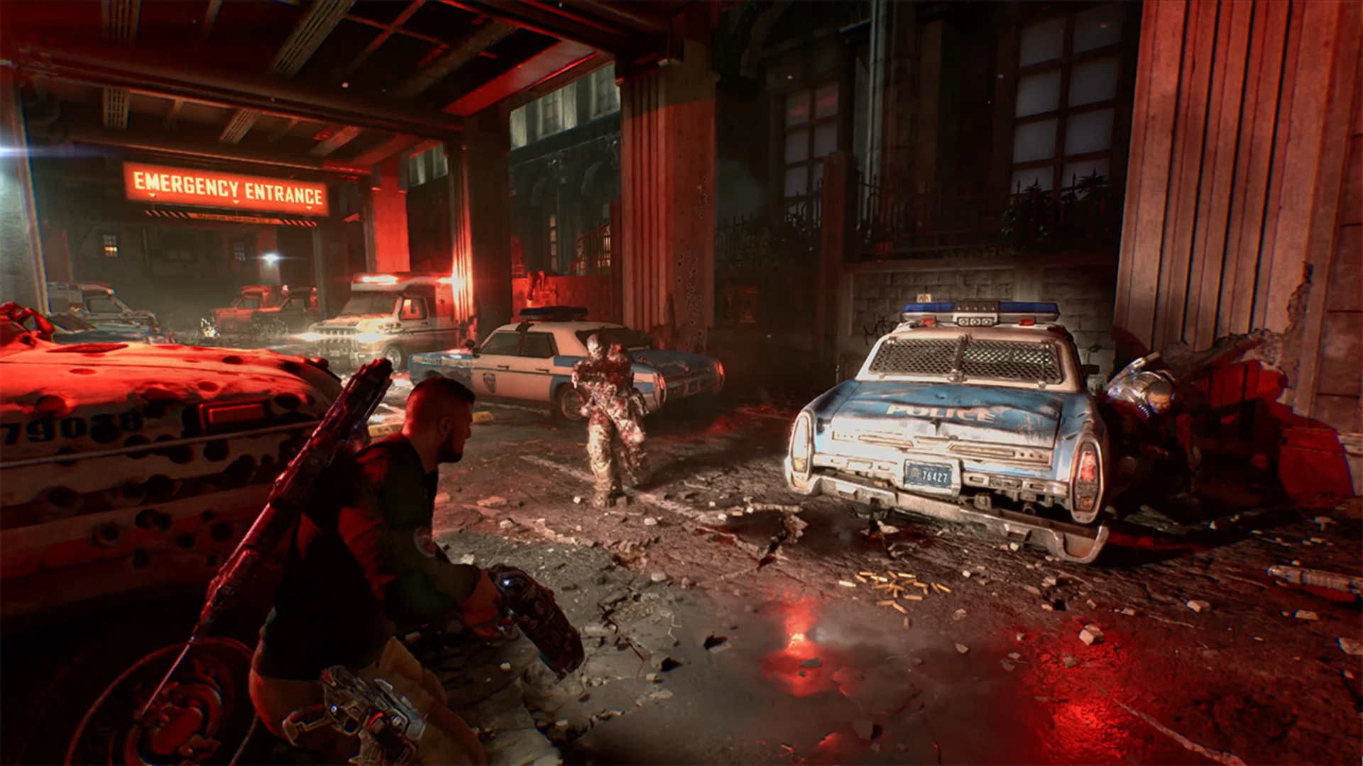 A Gears of War: E-Day soldier takes cover near damaged police vehicles while fighting an enemy outside an emergency entrance.