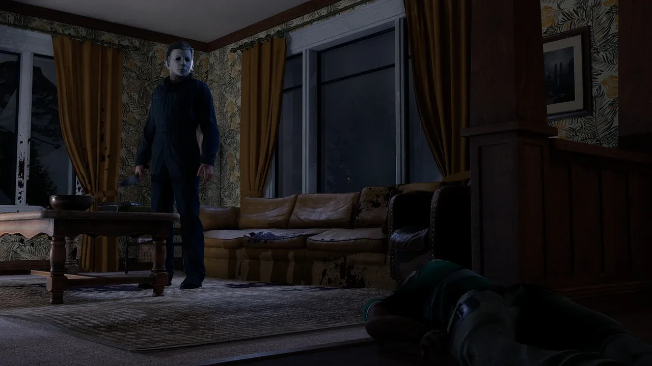 Michael Myers holds a knife while standing over a victim in a dark living room in Halloween: The Game.