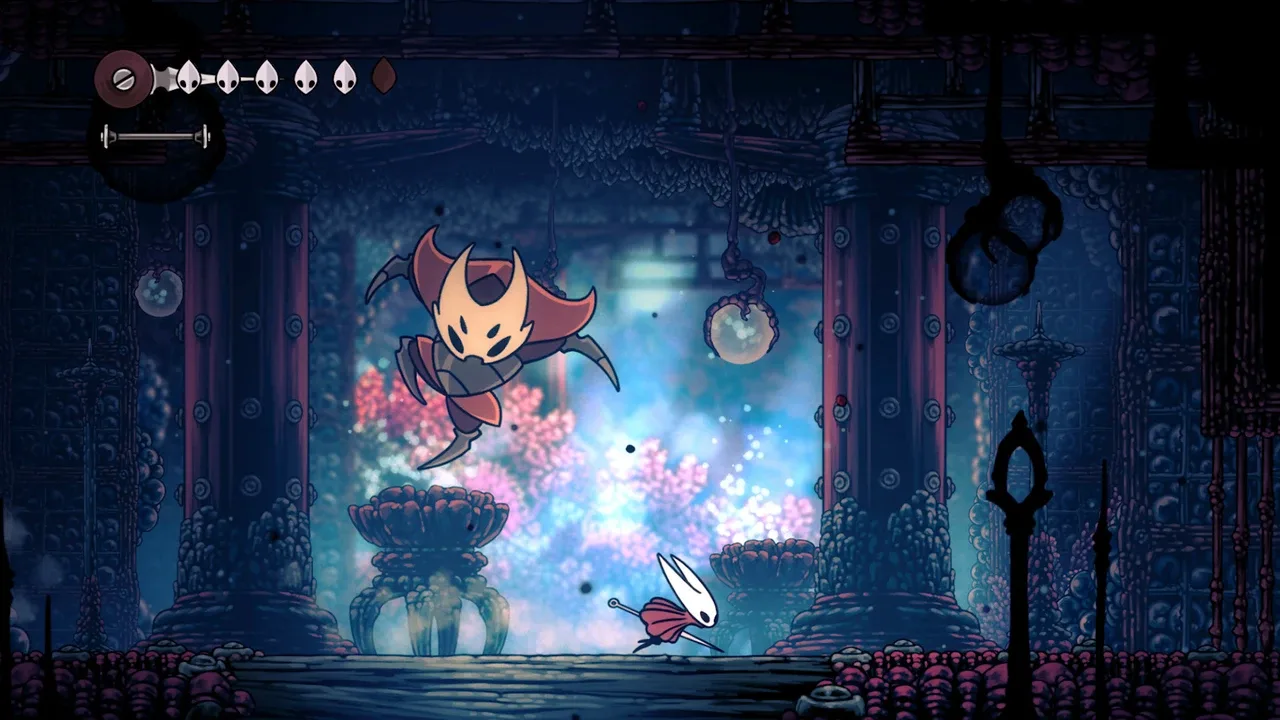 Hornet battles a large airborne enemy inside a dark, ornate chamber in Hollow Knight: Silksong.