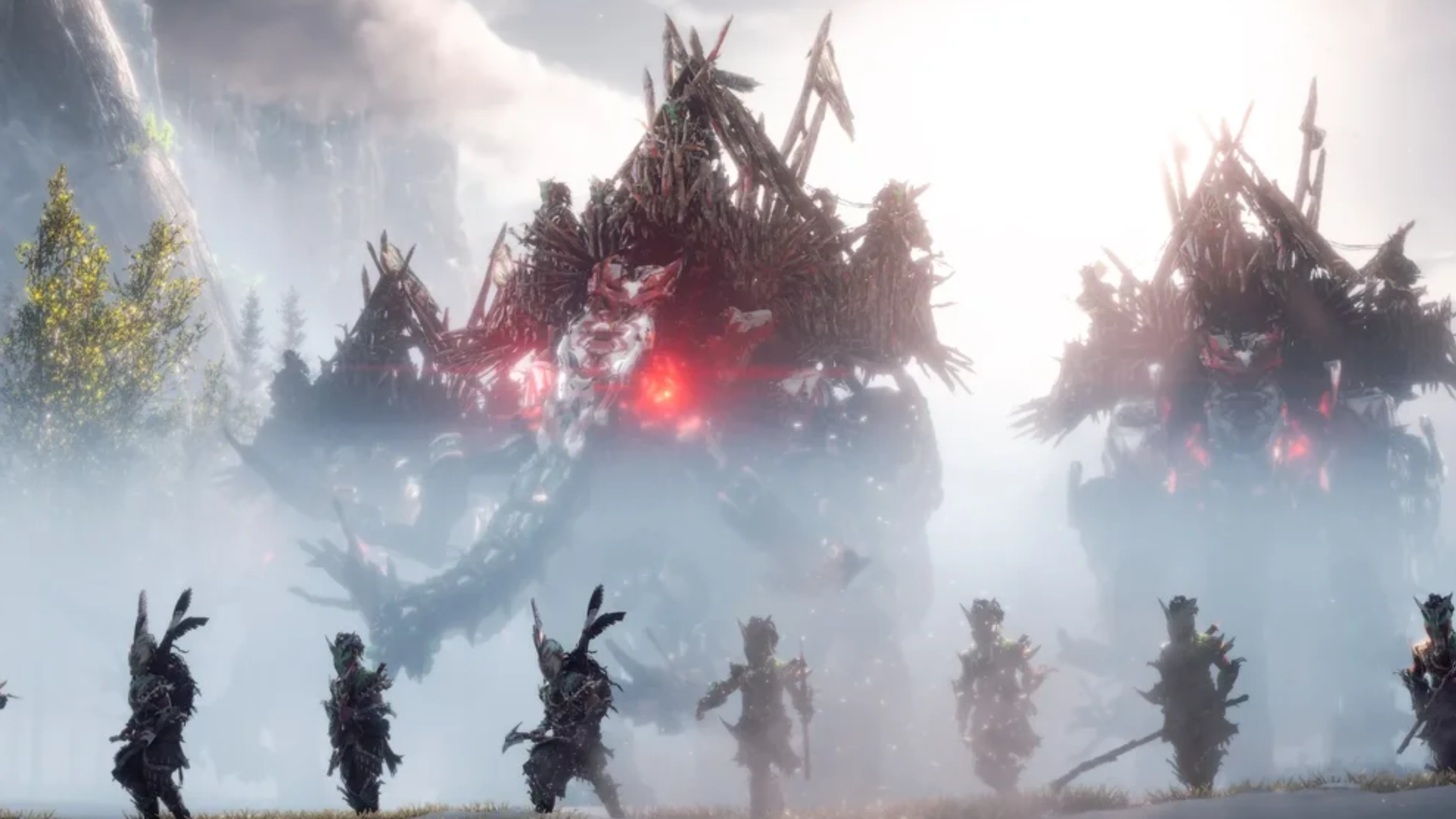 Horizon Forbidden West scene showing towering hostile machines with glowing red lights and smaller enemies advancing through mist.