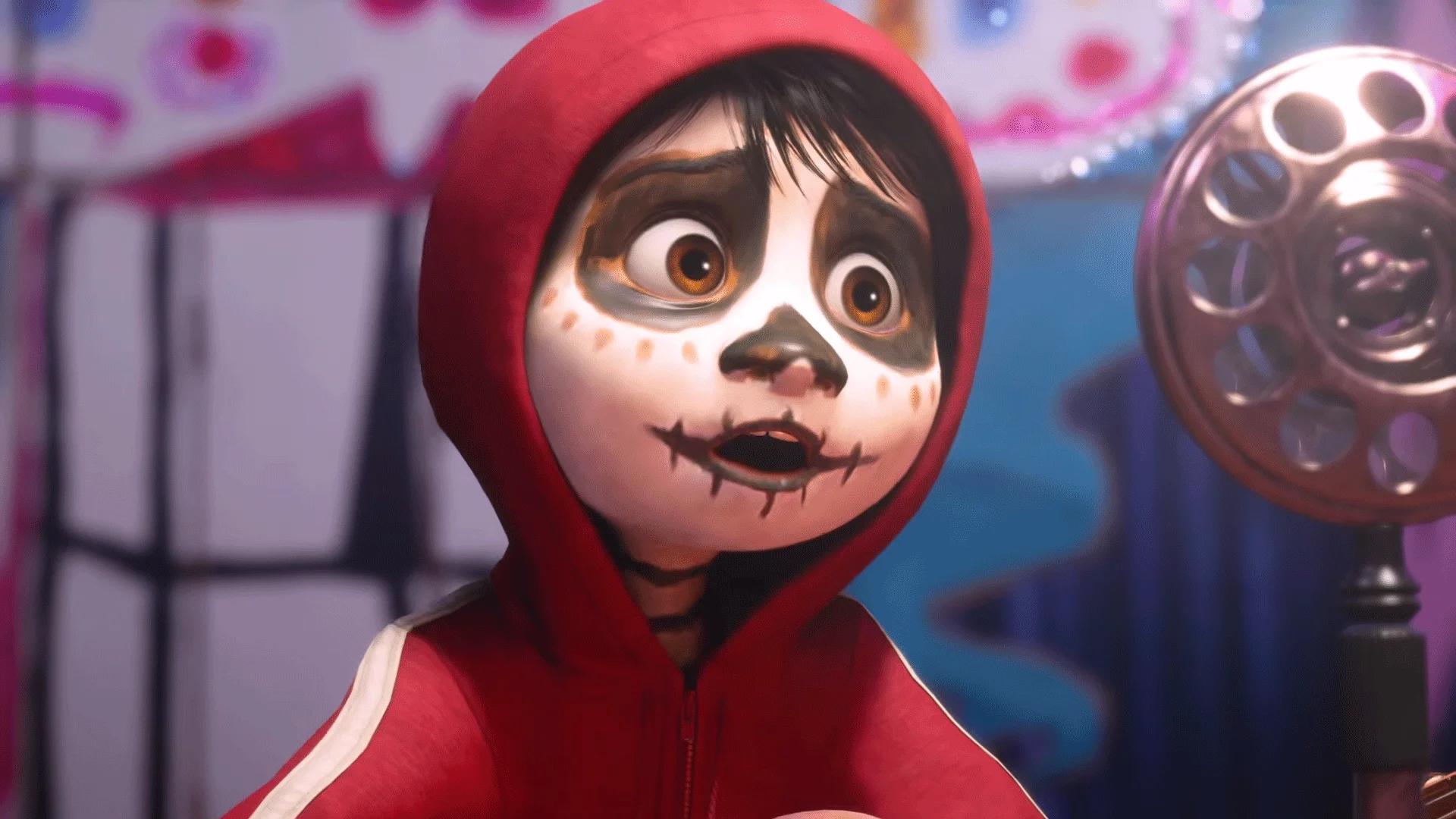 Miguel stands beside a microphone in the Coco-inspired world shown for Kingdom Hearts IV.
