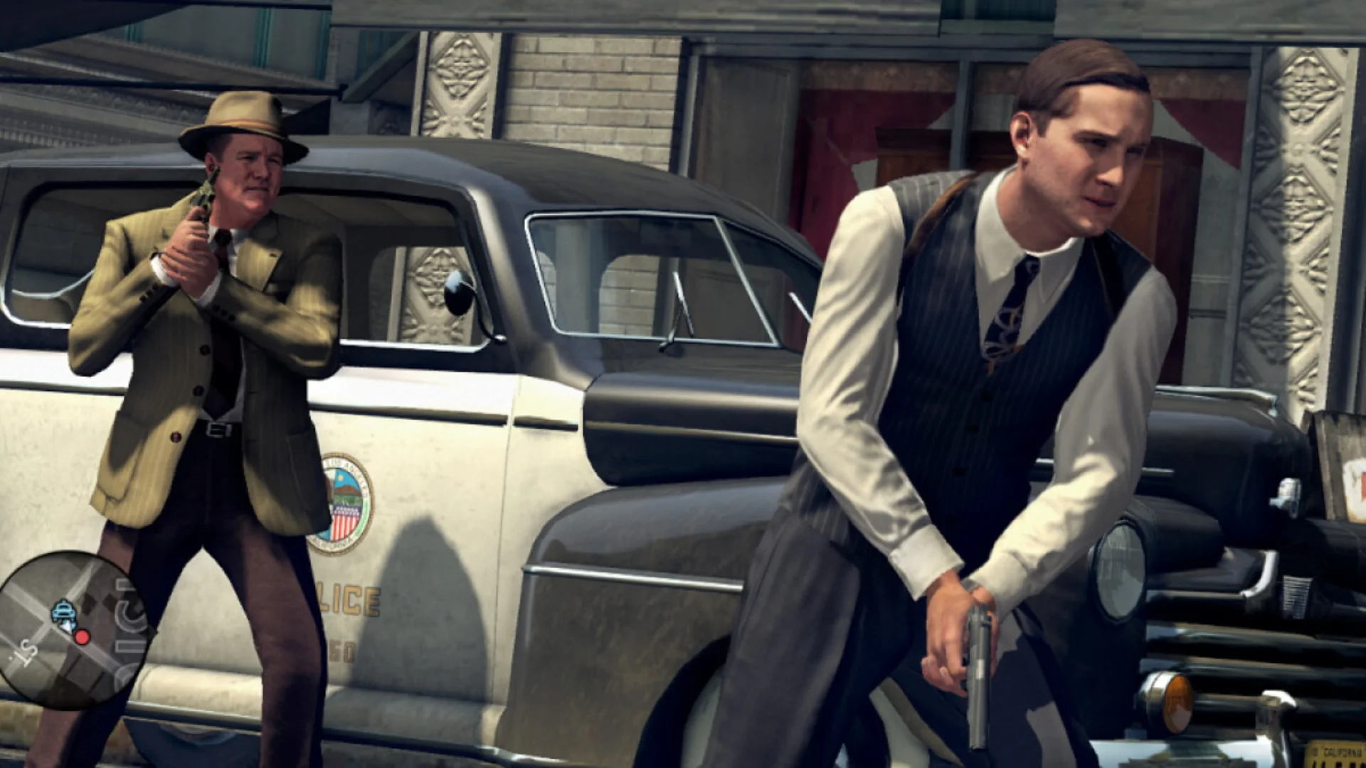 Two detectives with handguns take cover beside a police car during a street shootout in L.A. Noire.