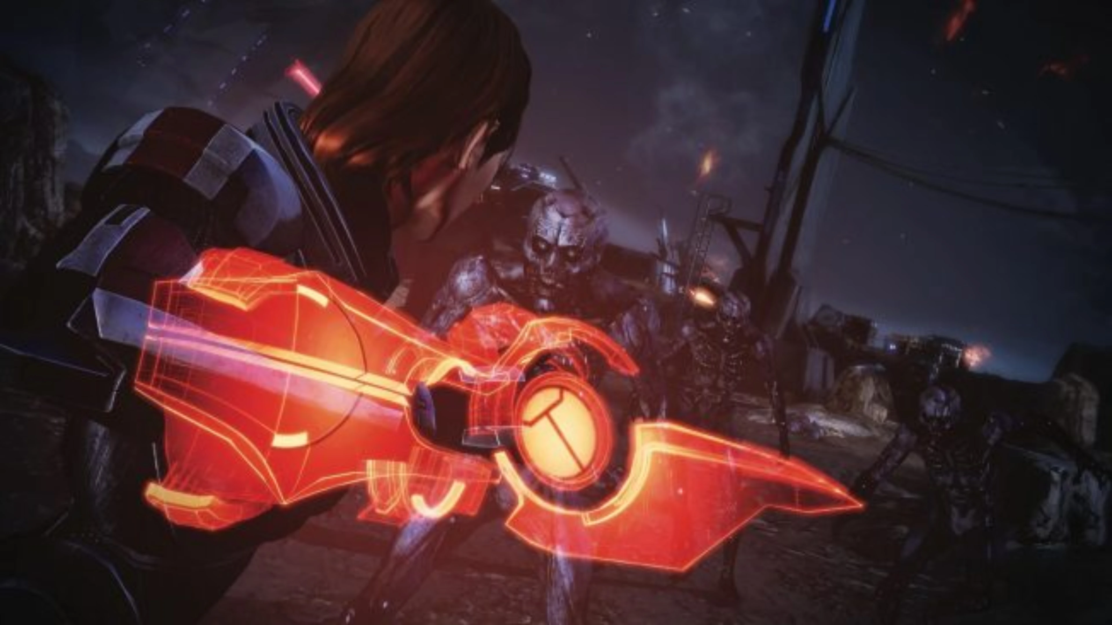 Mass Effect character holding a glowing red holographic weapon while facing a heavily armored enemy in a dark, ruined environment.