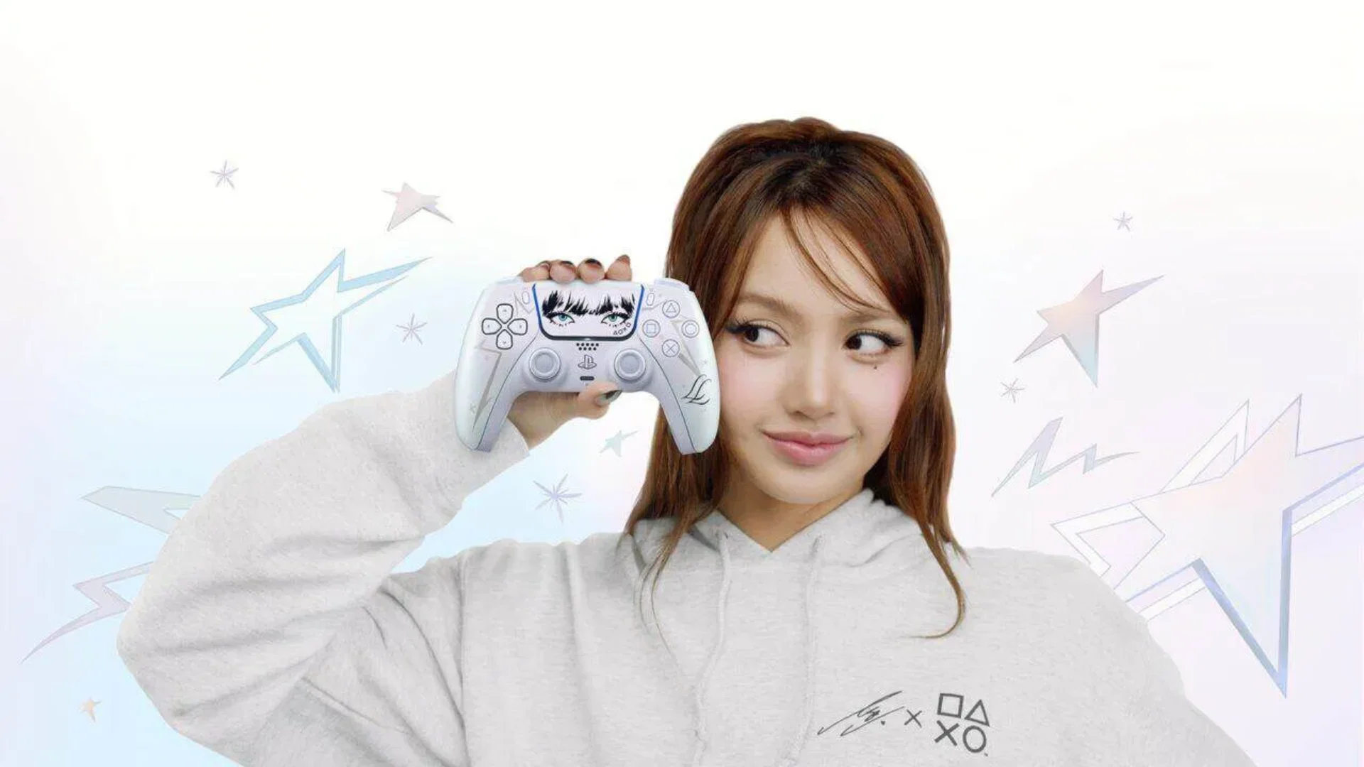 A woman holds the white LISA Limited Edition DualSense controller beside her face against a bright backdrop.