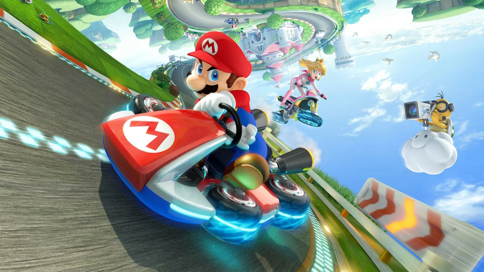Mario drives an anti-gravity kart on a twisting track while Princess Peach races behind him in Mario Kart 8 Deluxe.