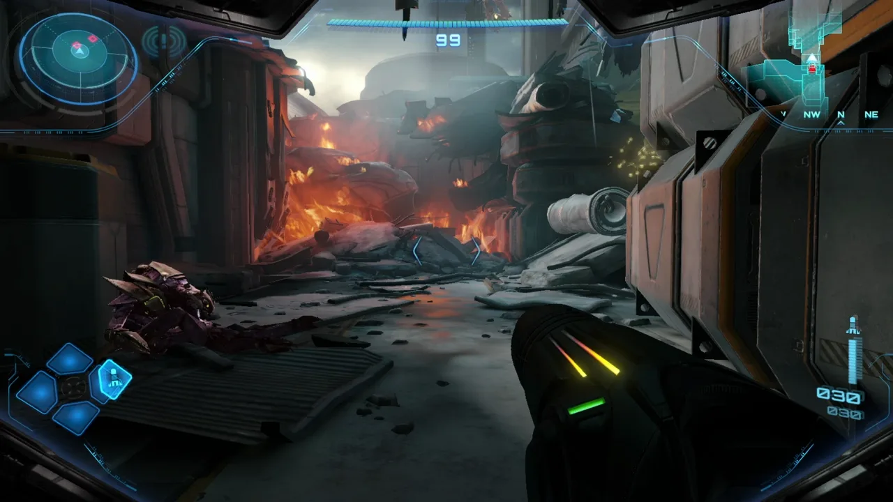 First-person view of Samus exploring a burning facility filled with rubble in Metroid Prime 4: Beyond.