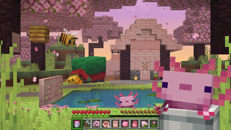 A pink axolotl in a colorful cherry blossom biome enhanced by the Actions & Stuff resource pack.