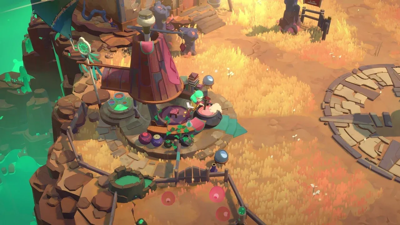 A green-haired merchant prepares items at a colourful outdoor camp surrounded by golden grass in Moonlighter 2: The Endless Vault.