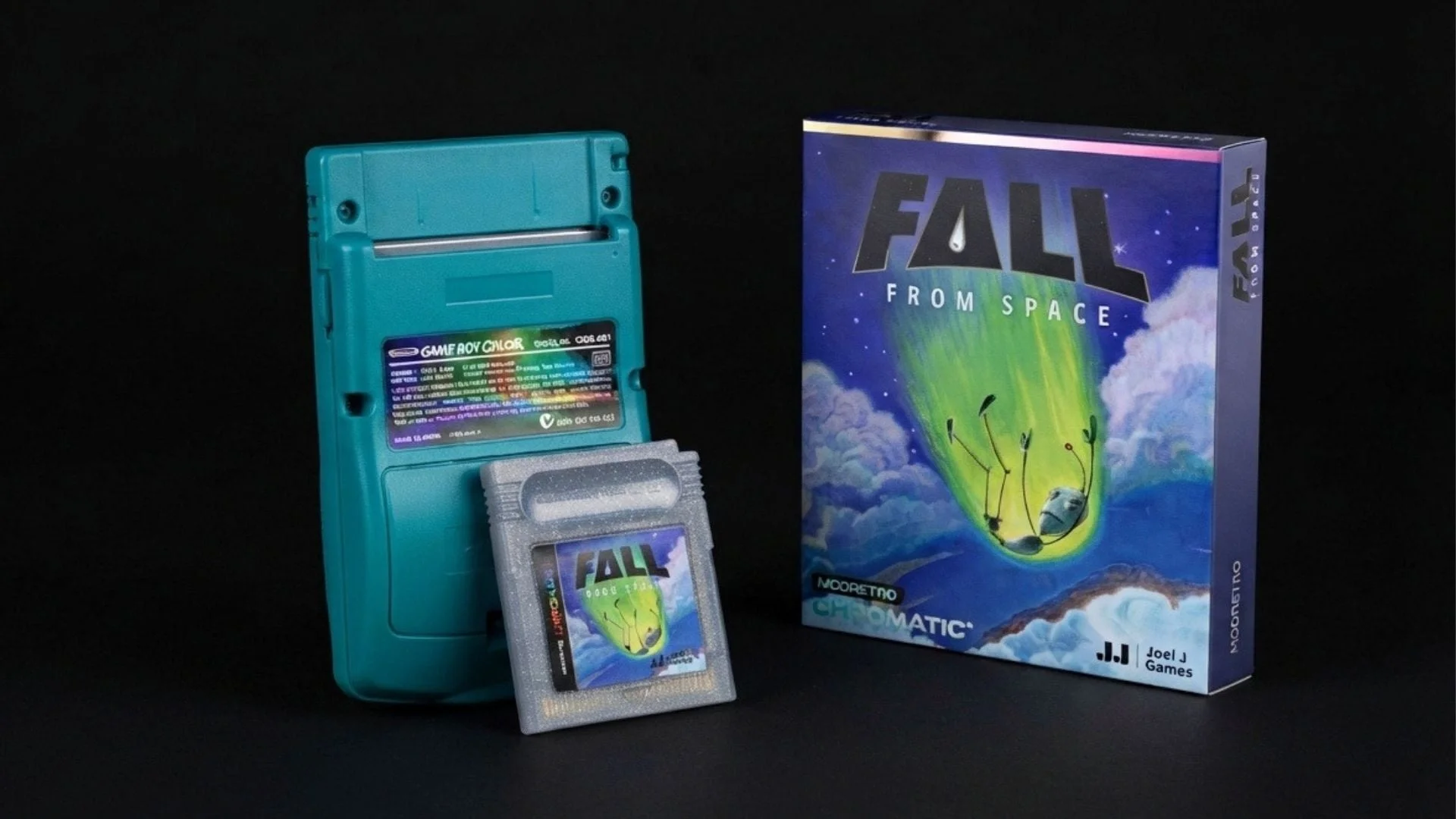 Fall from Space cartridge and box sit beside a teal ModRetro Chromatic handheld.