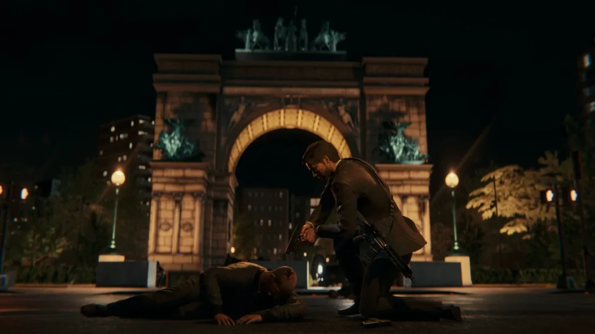 Anton Blackwood performs a close-range takedown during a nighttime fight.