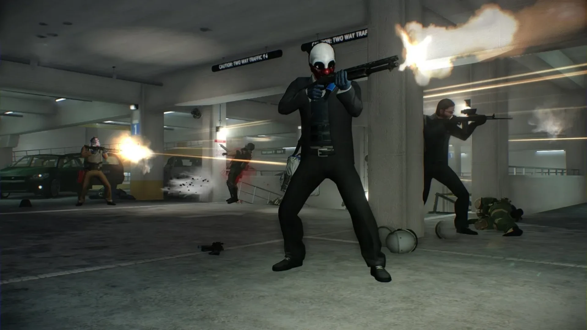 Masked Payday 2 crew members fire weapons during a gunfight inside a parking garage.