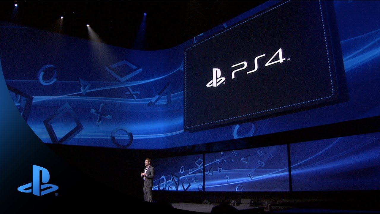 The PlayStation 4 logo appears on a large screen during Sony’s official PS4 presentation.