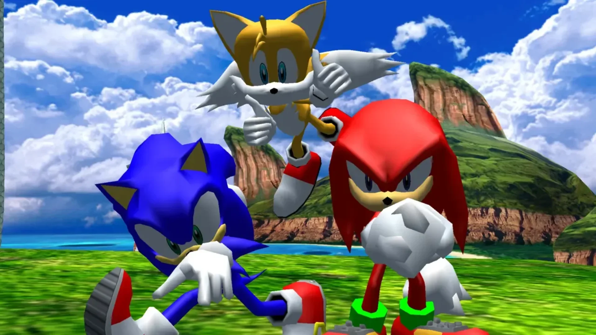 Sonic stands with Knuckles and Tails inside a colorful environment in Sonic Heroes.