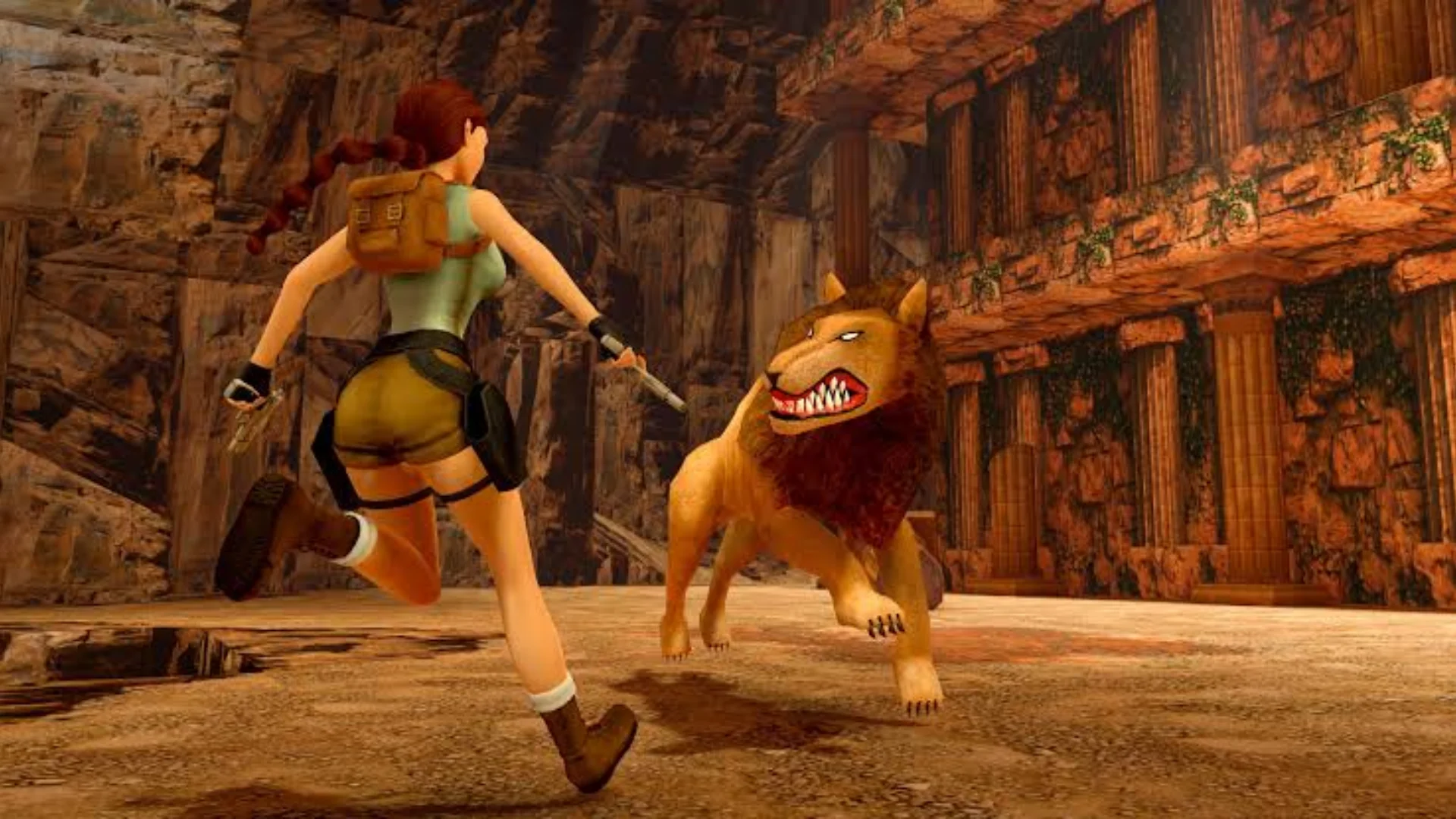 Lara Croft runs from a snarling creature inside stone ruins in Tomb Raider IV-VI Remastered.
