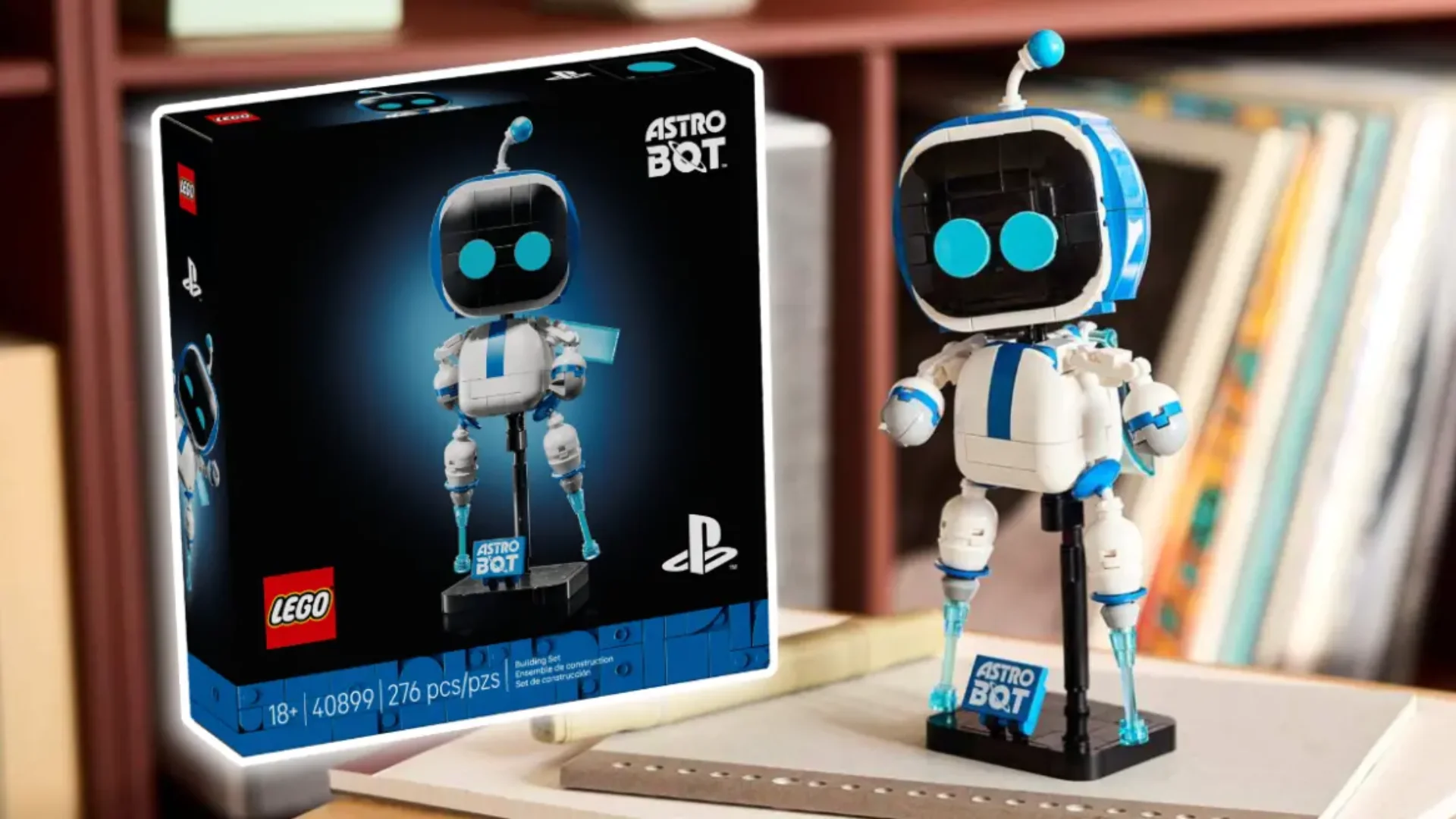 LEGO Astro Bot model stands beside its 276-piece PlayStation-branded building set box.
