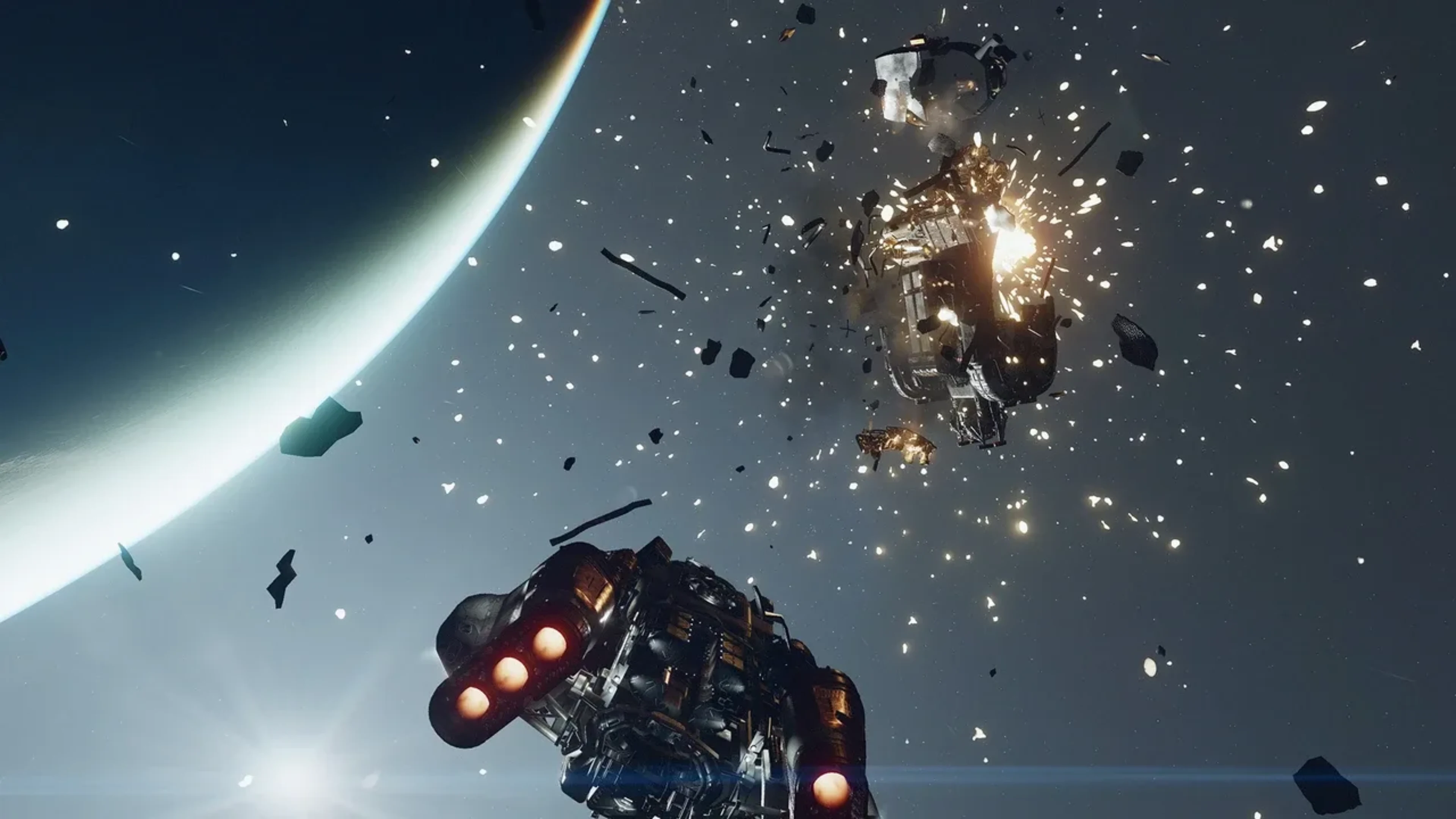 Starfield space combat showing a spaceship breaking apart in an explosion as another vessel flies nearby against a planet.