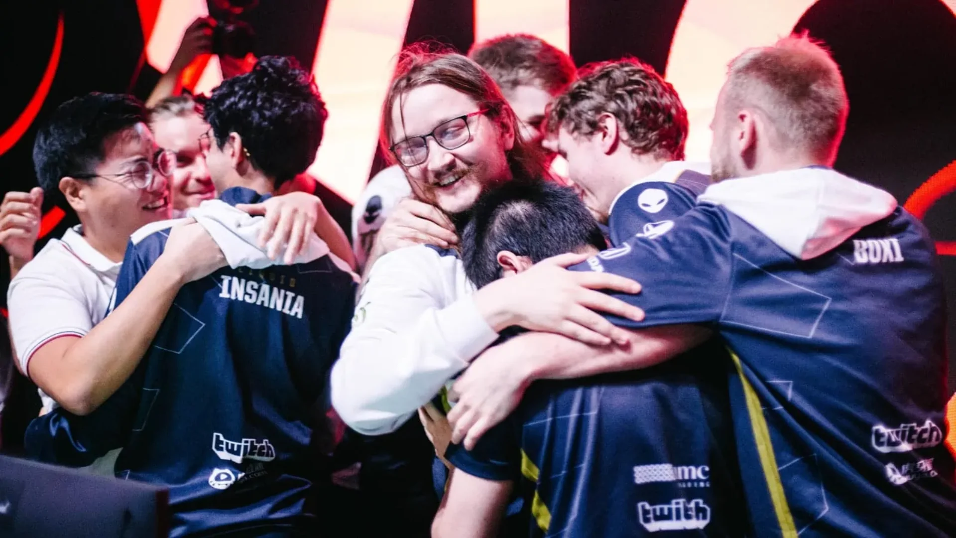 Team Liquid players celebrate together on stage after winning the 2026 LCS Summer Championship.