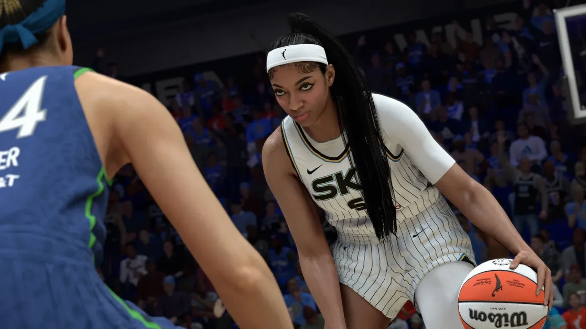 WNBA players face each other on court during NBA 2K26 gameplay