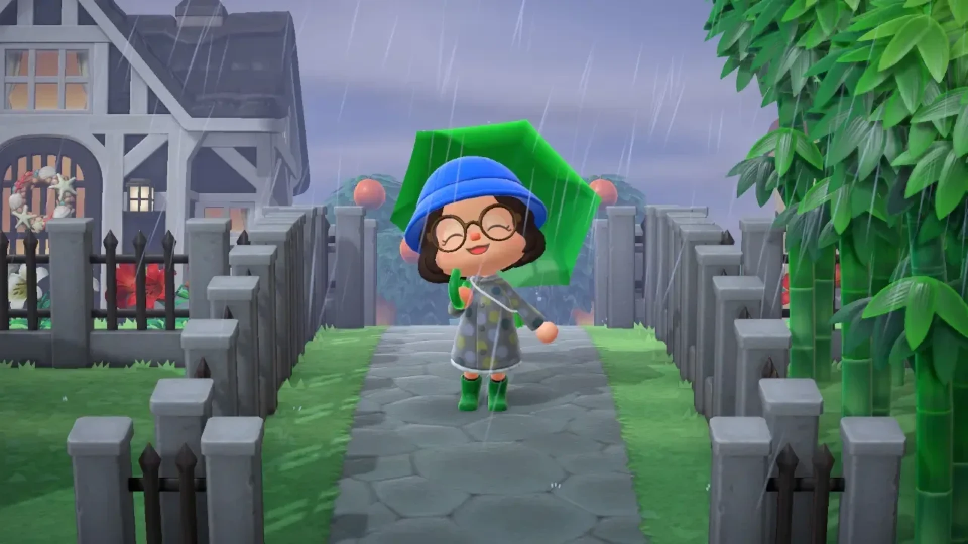 Animal Crossing: New Horizons villager walks through the rain holding a green umbrella.