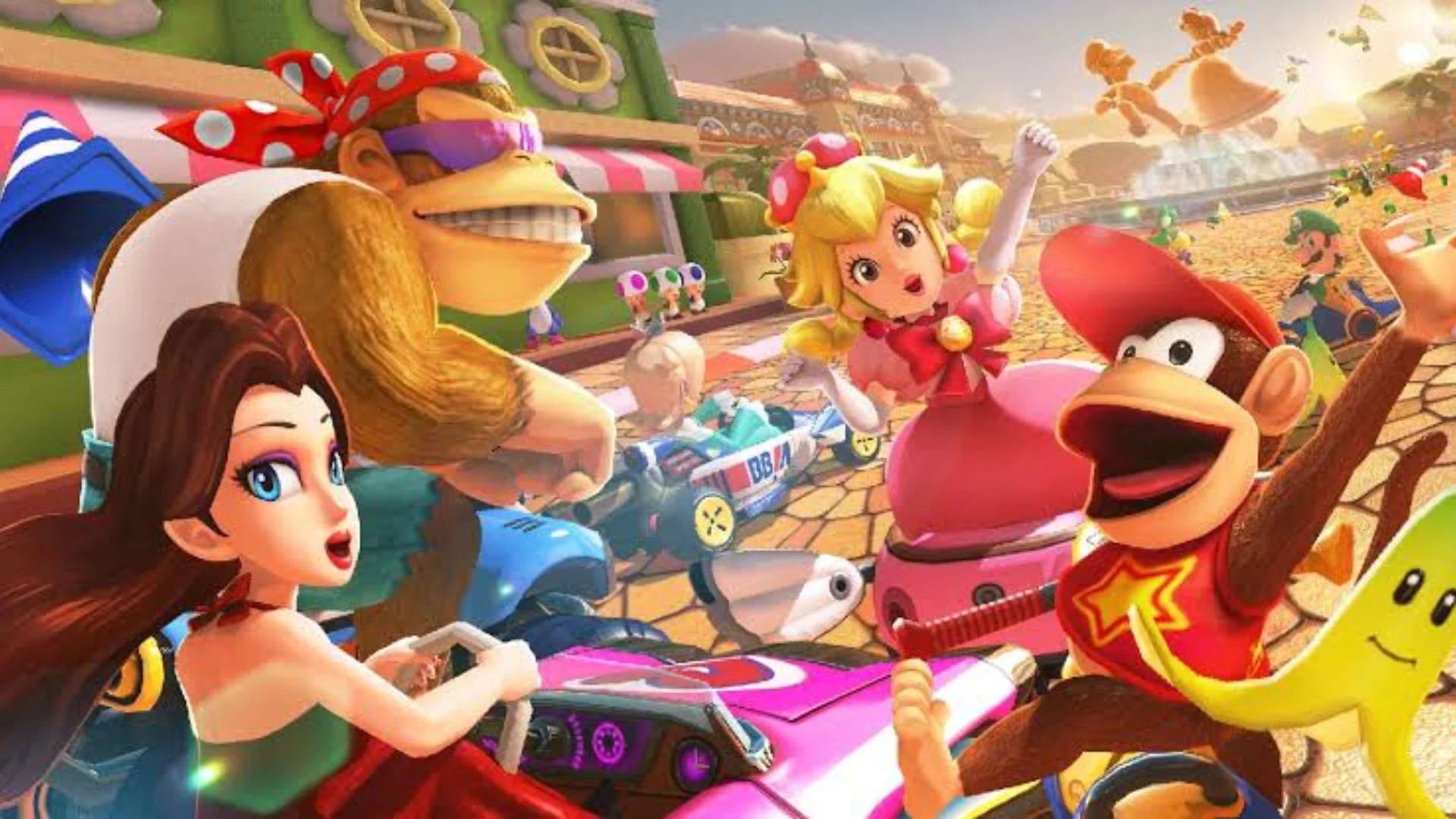 Mario Kart 8 Deluxe artwork featuring Peach, Diddy Kong, Pauline, and other racers.