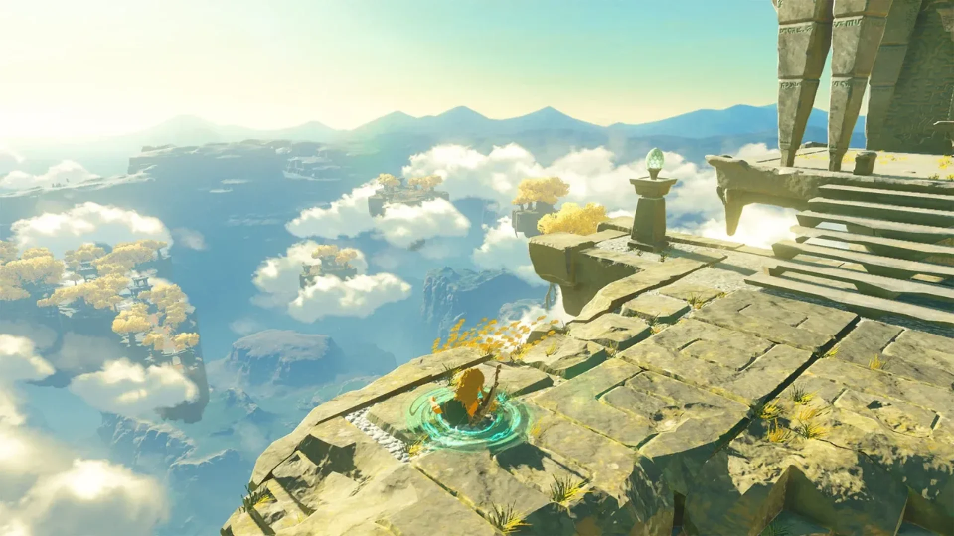 Link overlooks floating Sky Islands from ancient ruins in Tears of the Kingdom.