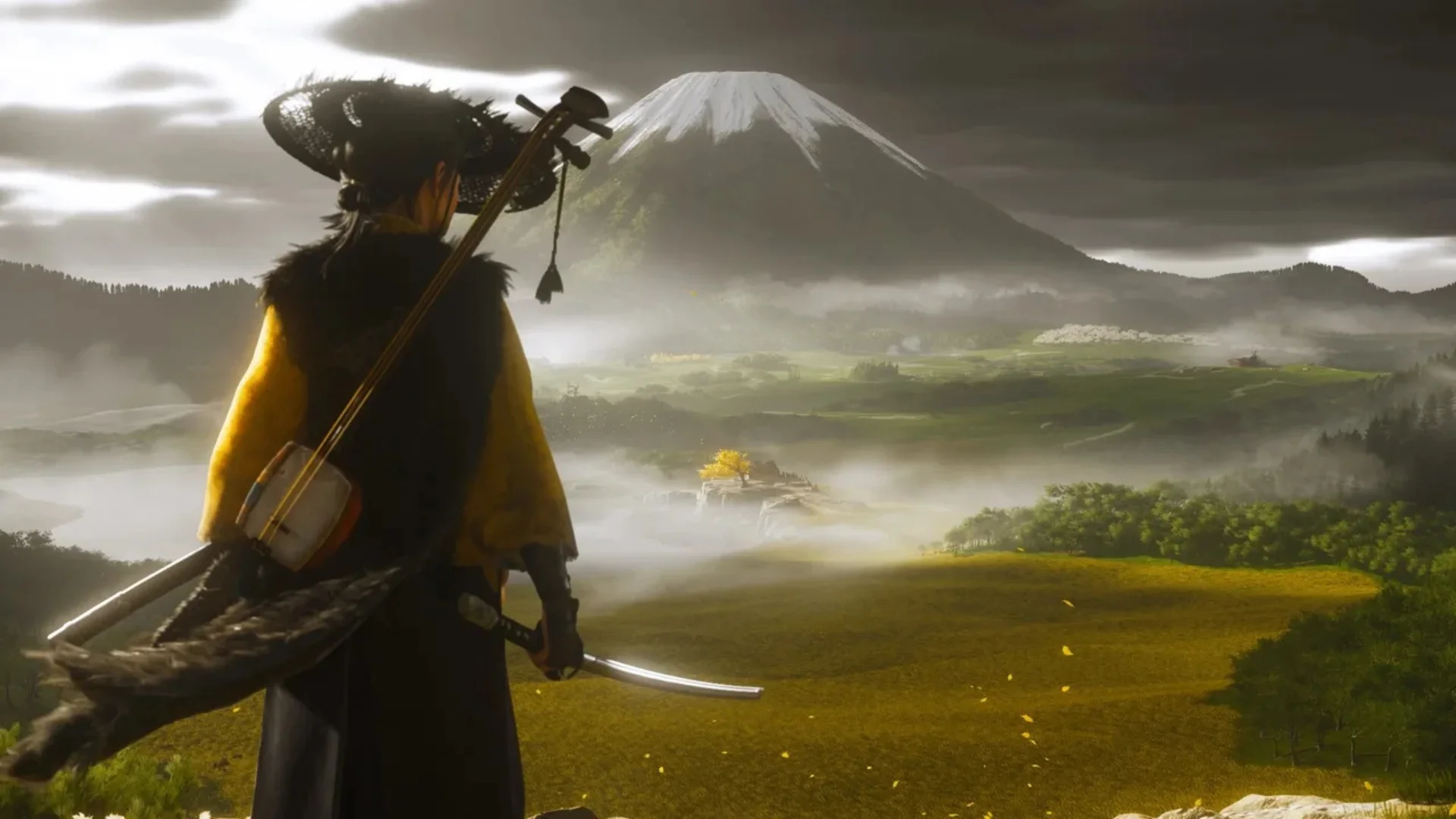 Atsu stands with a sword and instrument while overlooking Mount Yōtei and a misty Japanese landscape