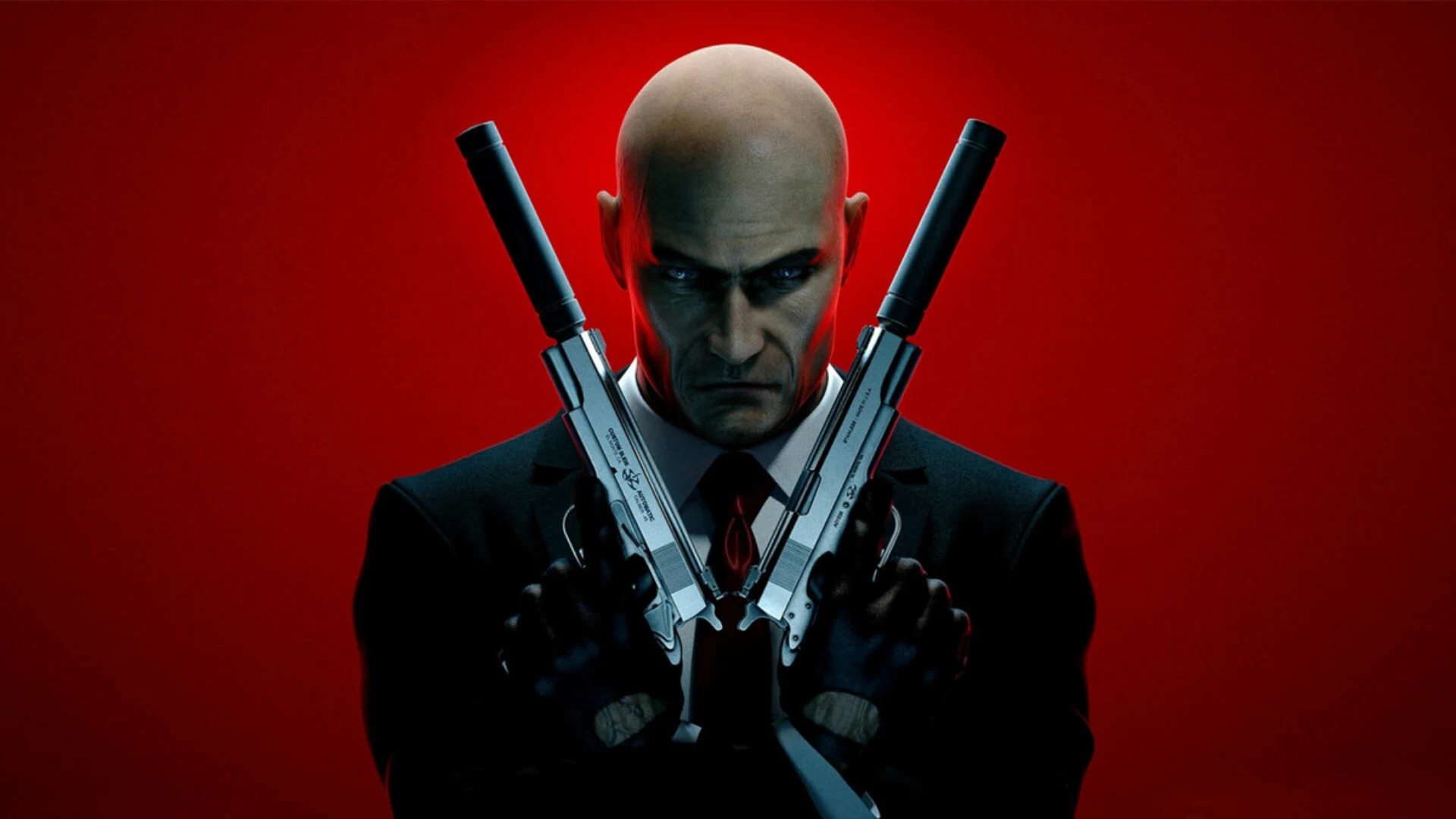 Hitman World of Assassination artwork features Agent 47 in his signature suit holding two suppressed Silverballer pistols.