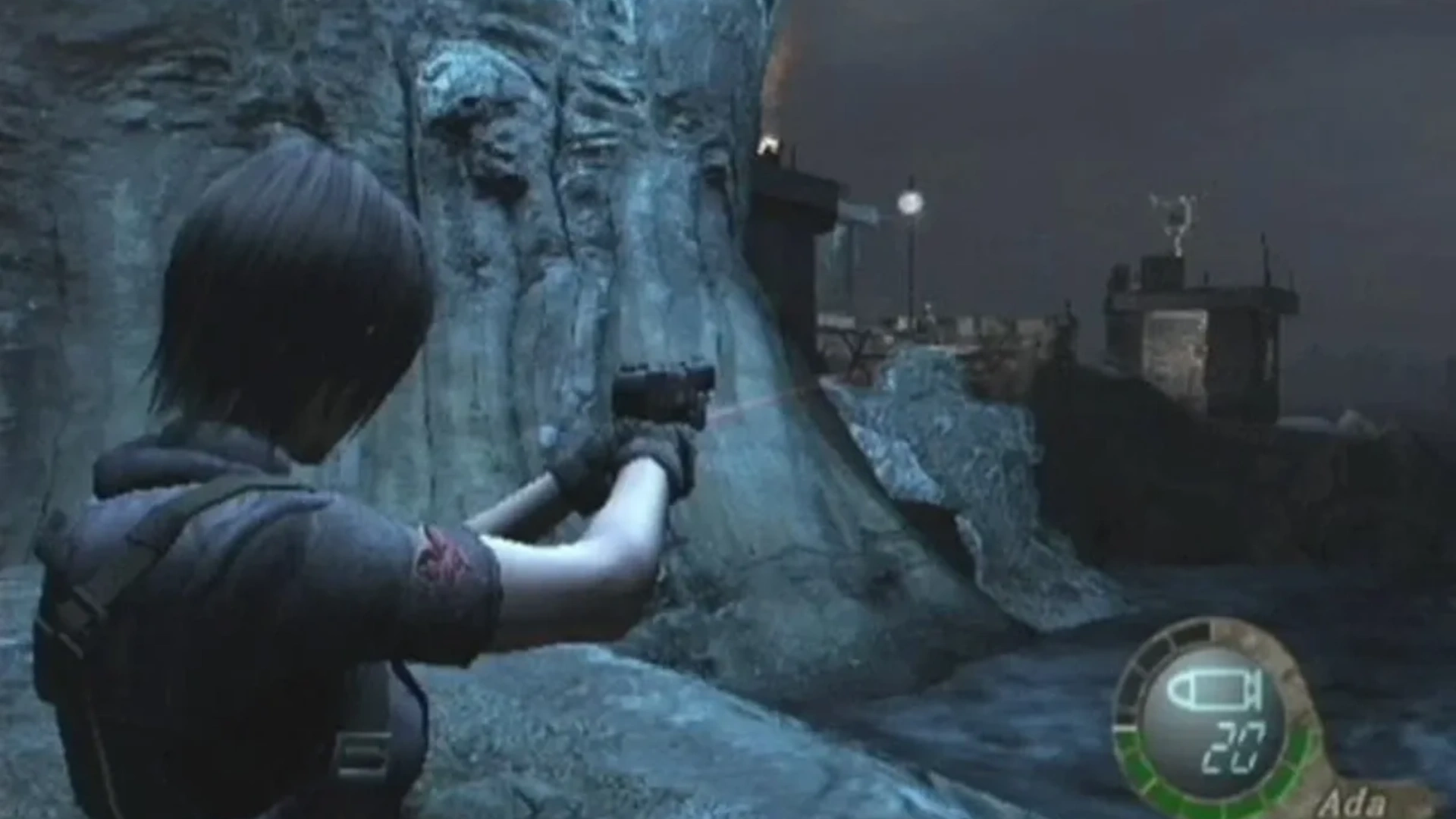 Resident Evil 4 character aims a pistol through a dark ruined area