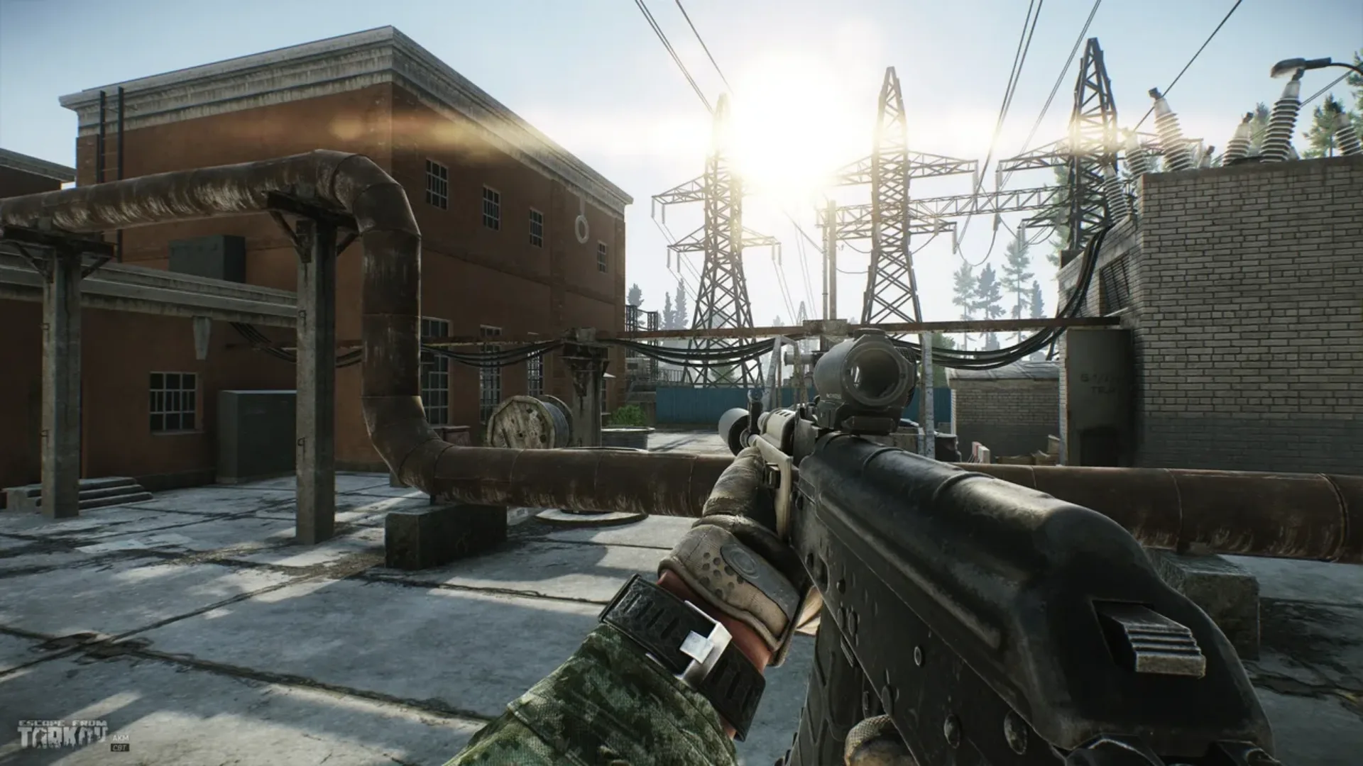Escape from Tarkov first-person gameplay overlooking an industrial power facility