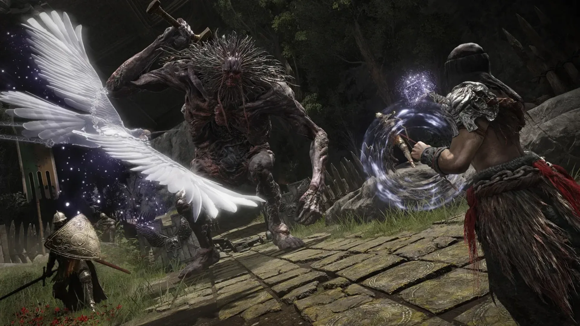 Elden Ring players fighting a giant enemy with weapons and magic