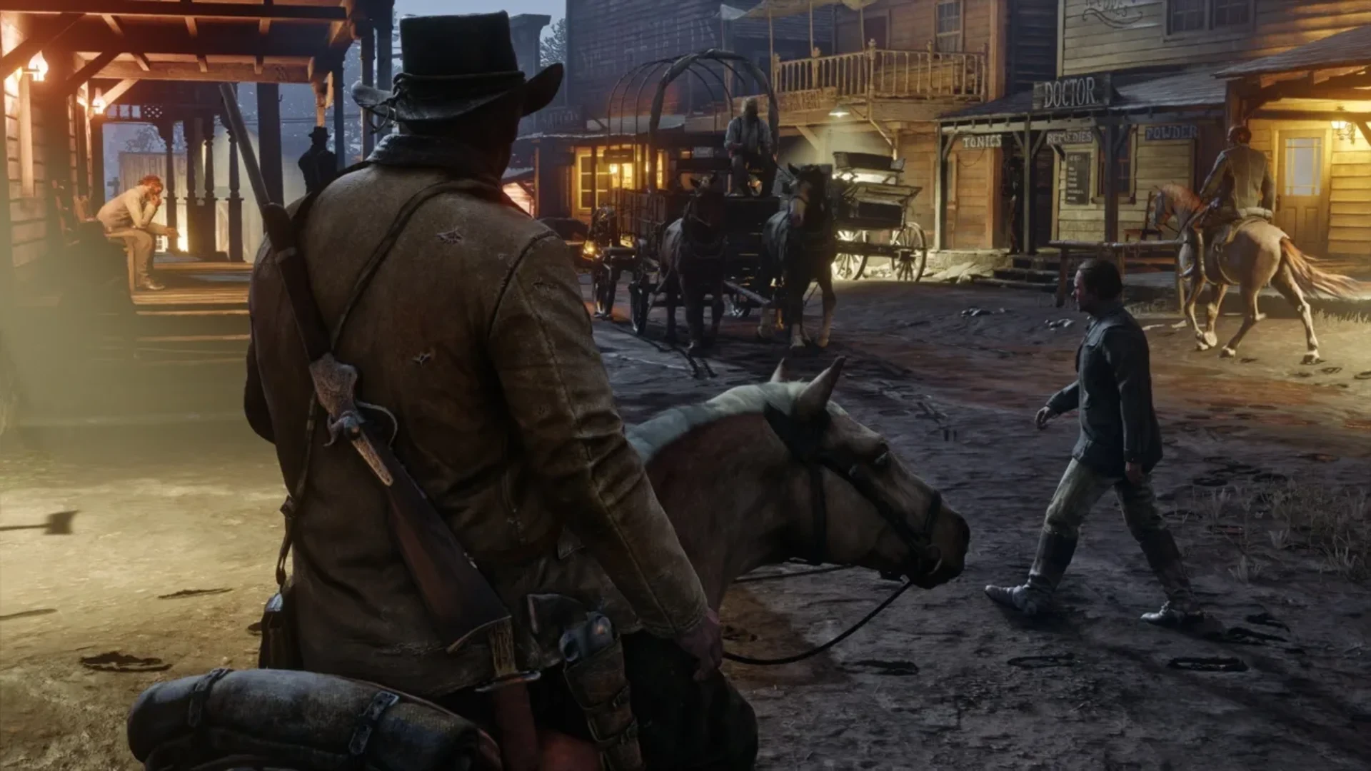 Red Dead Redemption 2 screenshot showing Arthur Morgan riding through a frontier town filled with horses, wagons, shops, and townspeople.