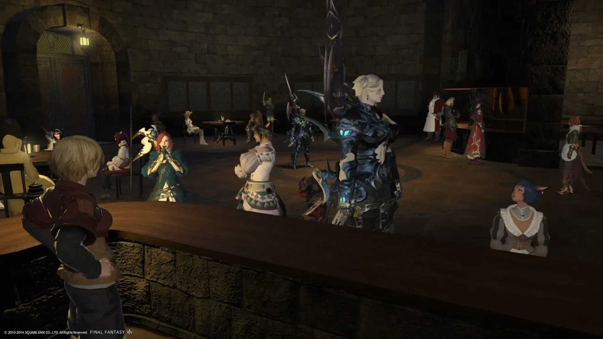 Final Fantasy XIV players and characters gathered inside a busy tavern