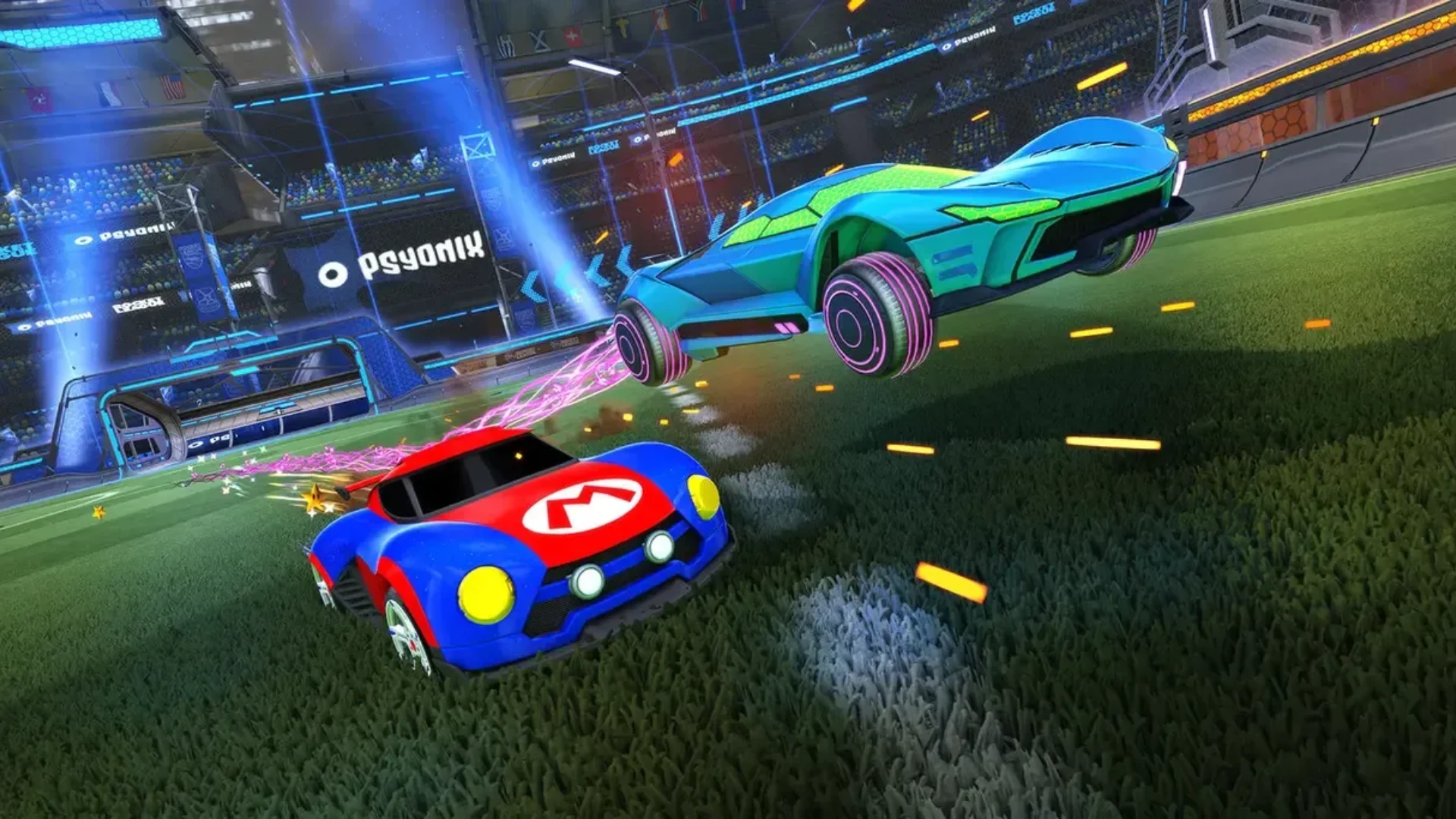 Two Rocket League cars race across the field inside a brightly lit stadium
