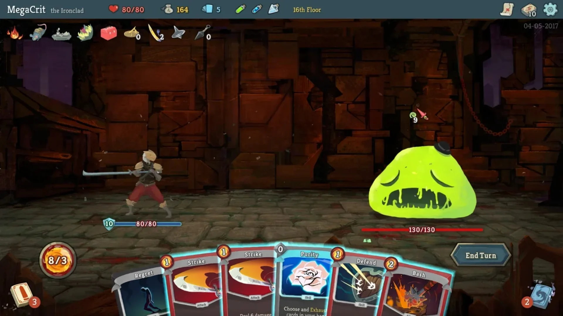 The Ironclad faces the Slime Boss while attack, skill, and defense cards fill the hand in Slay the Spire.