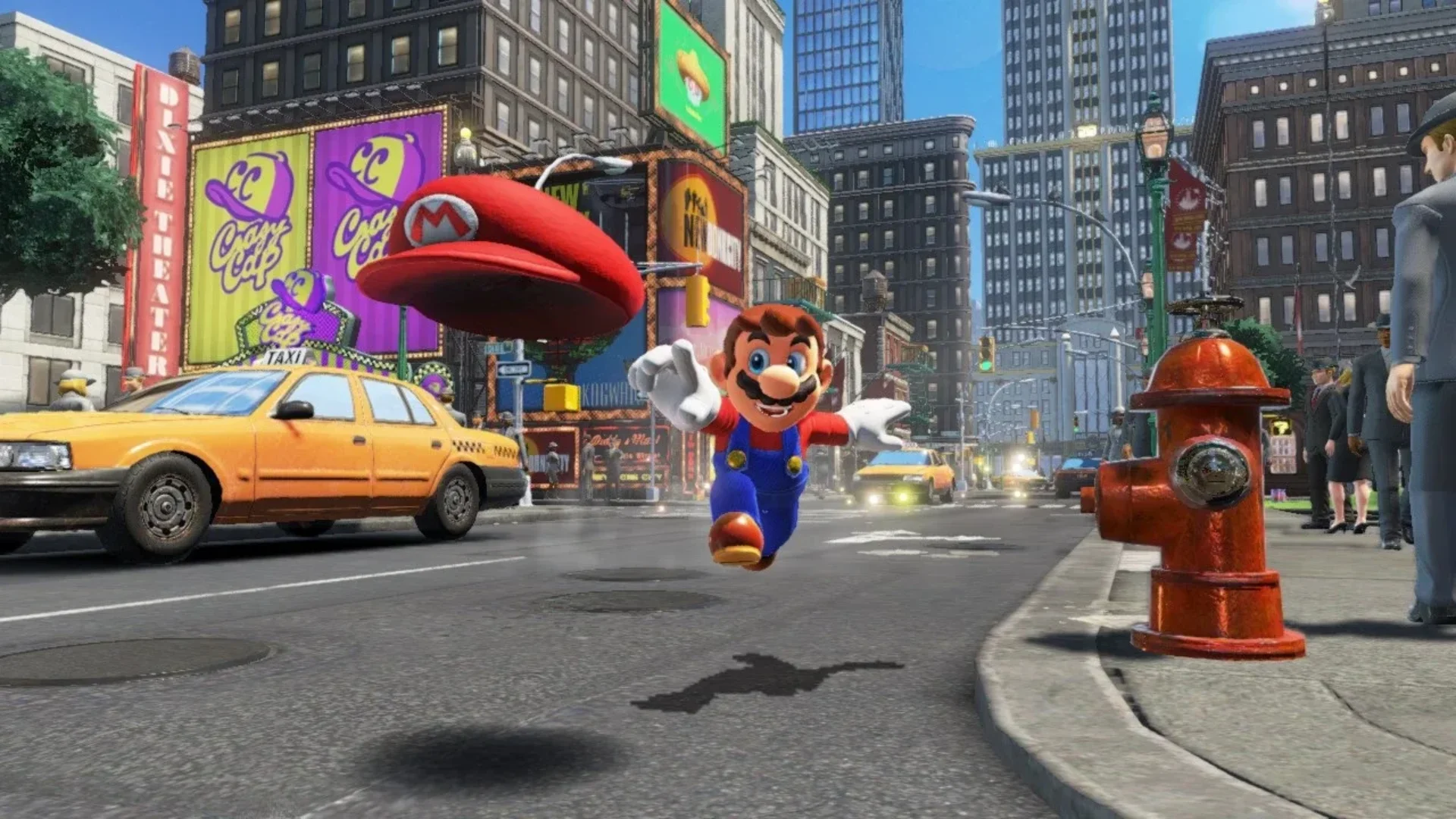 Mario runs through New Donk City while throwing Cappy above a busy street in Super Mario Odyssey.