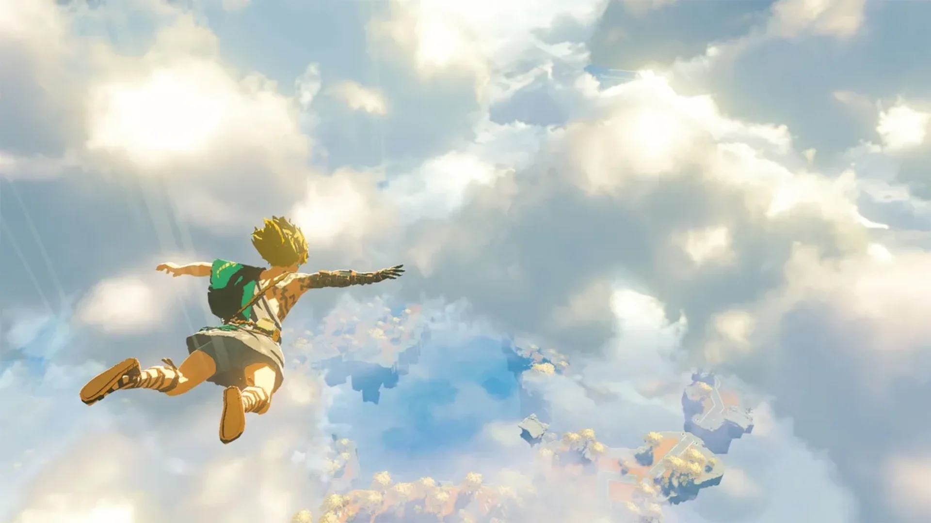 Link dives through bright clouds toward floating Sky Islands in The Legend of Zelda: Tears of the Kingdom.