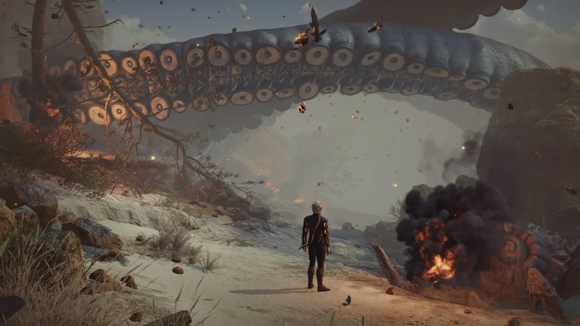 Baldur’s Gate 3 characters exploring the Ravaged Beach with the game interface visible.