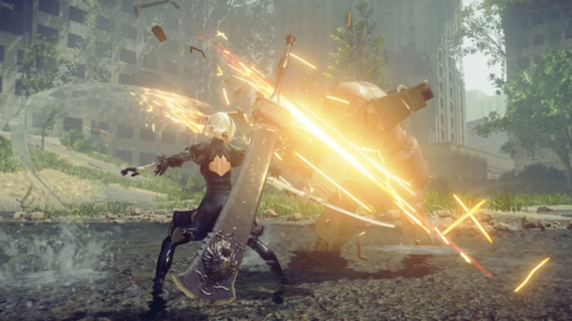 2B attacks a large machine enemy with her sword in NieR Automata.