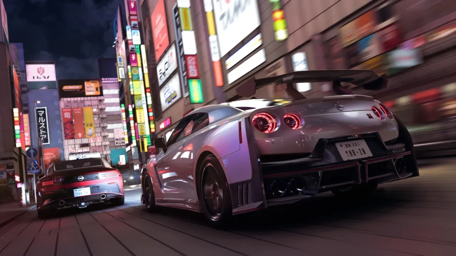 Two Nissan sports cars race through a neon-lit Japanese city at night in Forza Horizon 6.